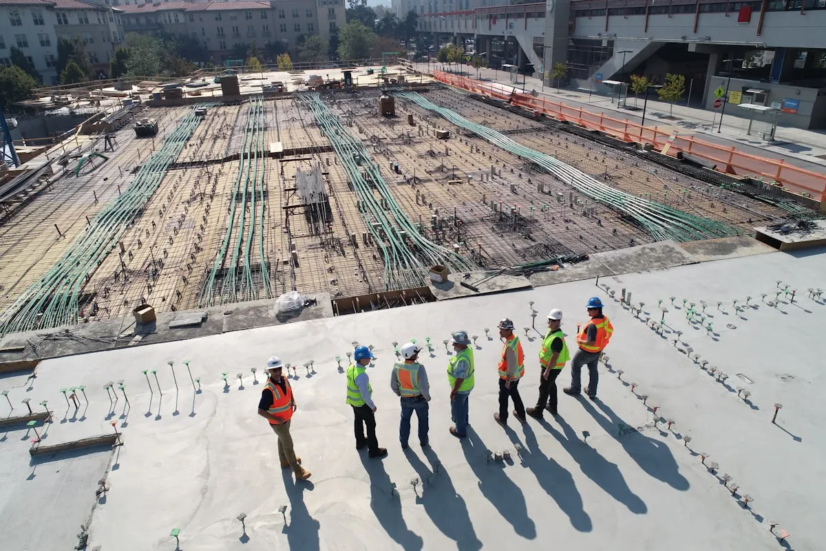 Construction site with dirt and concrete being poured